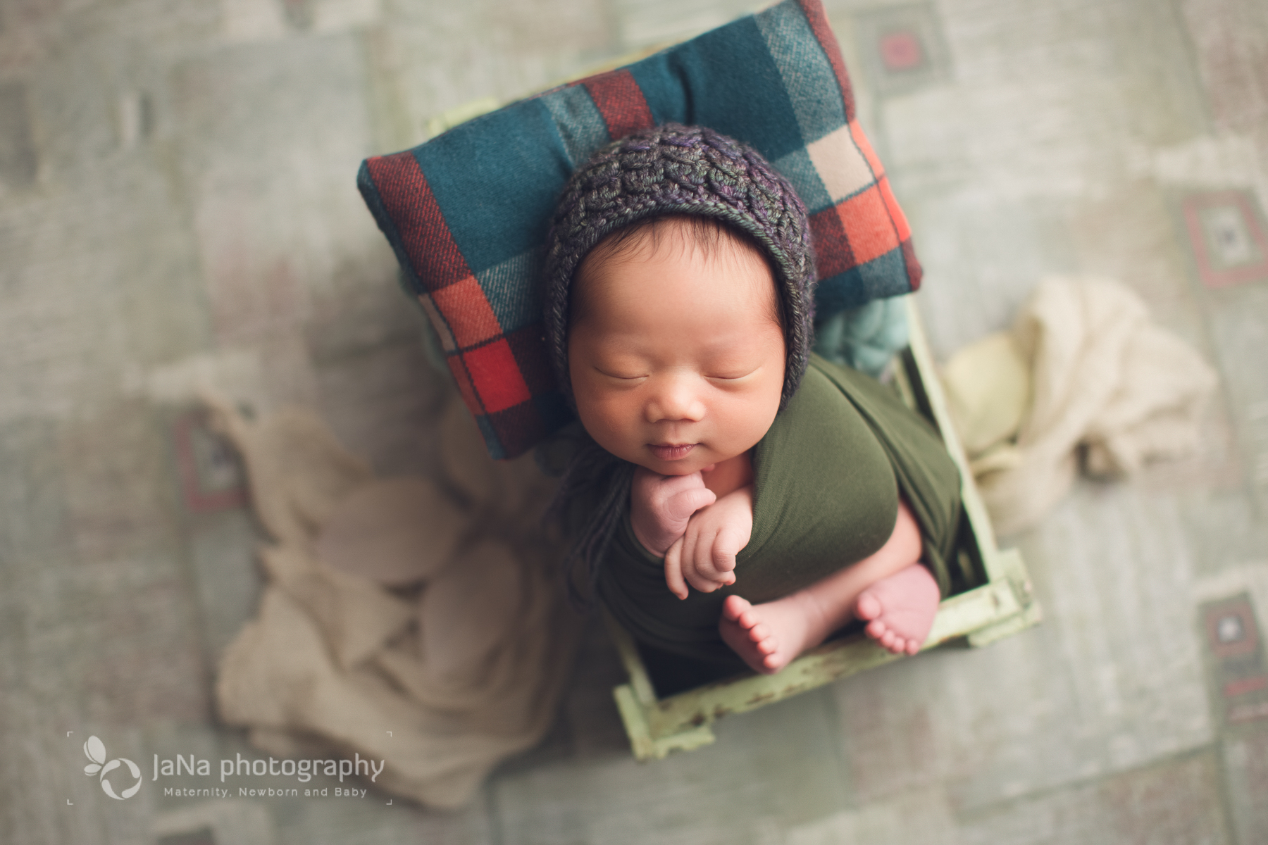 newborn photography - green bed