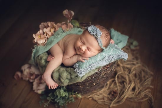 newborn photography baby girl smile 