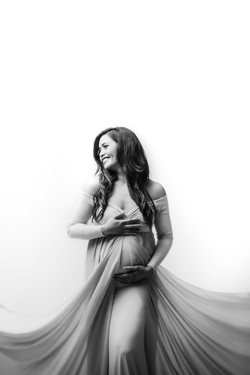maternity photography smile white gown