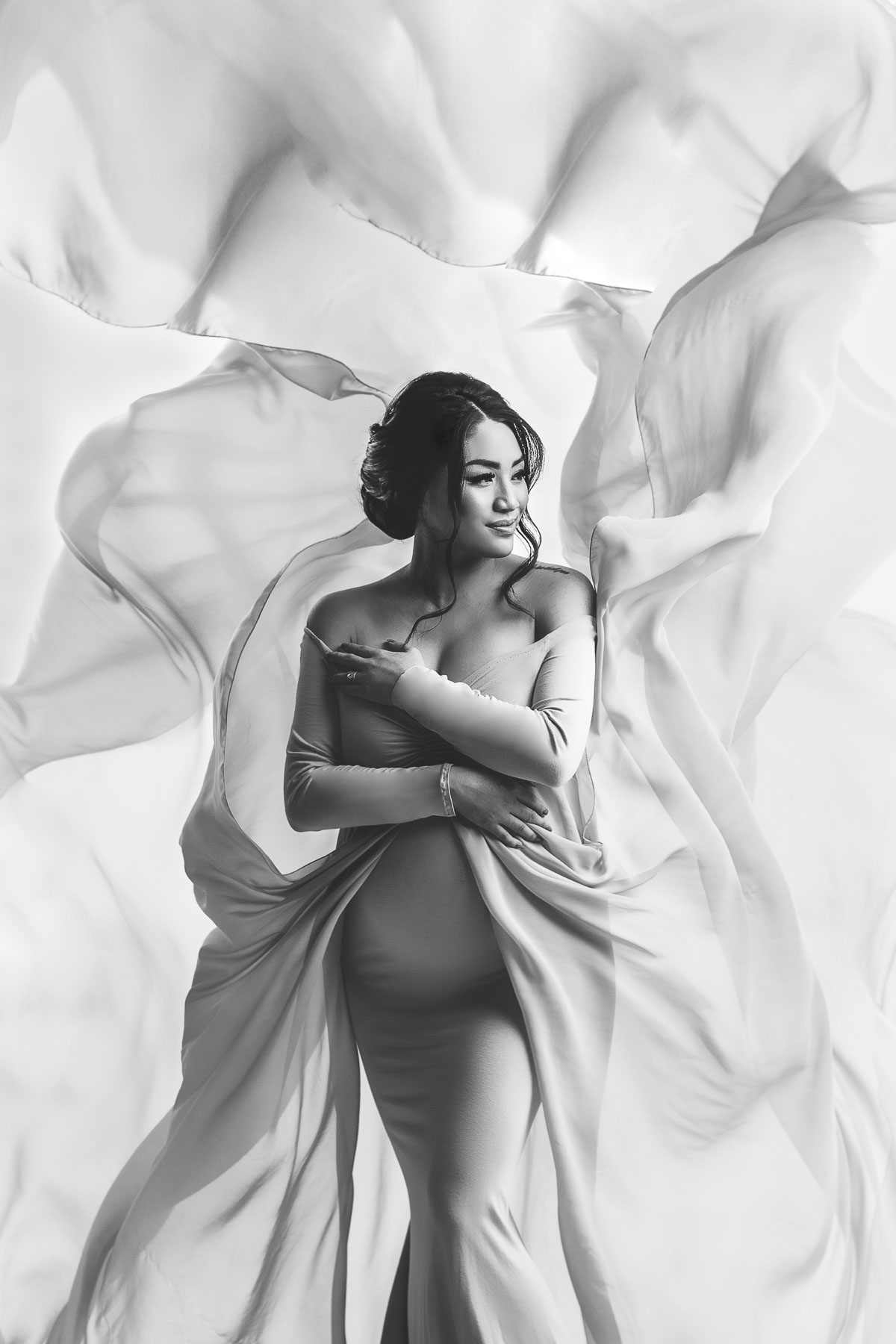 dreamy and beautiful black and white maternity photo with pregnancy gown