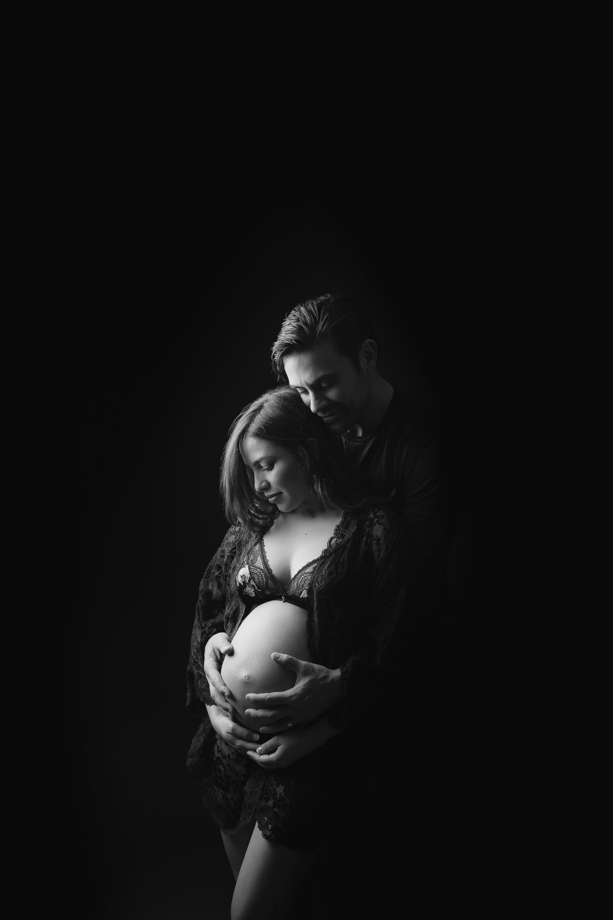 dreamy and artistic couple pose for maternity photography